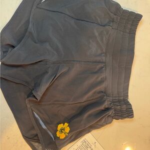 🌺Rare! lululemon black hotty hot Shorts with Yellow Floral Detail
